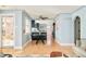 Bright dining area with a modern table, stylish chairs, and hardwood floors at 2972 Kearney St, Denver, CO 80207