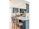 Updated kitchen with stainless appliances, marble countertops, and modern cabinetry at 2972 Kearney St, Denver, CO 80207