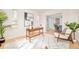 Inviting home office space with a view into a modern kitchen at 2972 Kearney St, Denver, CO 80207