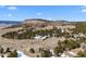 Wide landscape with a clear view of the rolling terrain and sky at 2859 Cagle Dr, Larkspur, CO 80118
