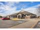 Exterior shot of Expo Recreation Center features accessible parking, a ramp, and large windows at 10792 E Exposition Ave # 154, Aurora, CO 80012