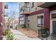Exterior of a modern building with a landscaped courtyard and balconies at 2501 15Th St # 2C, Denver, CO 80211