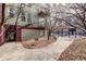 Building exterior featuring a sidewalk, stone landscaping, a walkway, and a gated entrance at 2501 15Th St # 2C, Denver, CO 80211