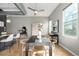 Bright dining area with stylish table, natural light, and adjacent kitchen, perfect for comfortable and modern living at 2501 15Th St # 2C, Denver, CO 80211