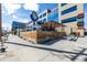Exterior of Denver Beer Co. featuring a street-level patio area with wooden fencing at 2501 15Th St # 2C, Denver, CO 80211