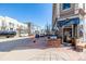 Street-level exterior view of a commercial building with storefront windows and a sidewalk area at 2501 15Th St # 2C, Denver, CO 80211
