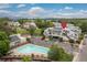 Desirable community featuring a pool, mature trees, and well-kept condominium buildings at 1820 Newland Ct # 310, Lakewood, CO 80214