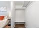 Walk-in closet with a shelf and hanging rack, providing ample storage space at 1820 Newland Ct # 310, Lakewood, CO 80214