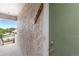 Hallway view outside a unit with view of the community pool at 1820 Newland Ct # 310, Lakewood, CO 80214