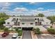 Charming multi-Gathering home featuring well-maintained grounds and convenient covered parking at 1820 Newland Ct # 310, Lakewood, CO 80214