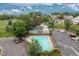 Aerial view of community pool and clubhouse at 1820 Newland Ct # 310, Lakewood, CO 80214