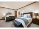 Comfortable bedroom featuring two queen beds with nice decor and trim at 77 Comstock Pl, Castle Rock, CO 80108