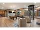 Large entertainment area featuring a pool table, shuffleboard table, and elevator at 77 Comstock Pl, Castle Rock, CO 80108