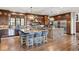 Modern kitchen with custom cabinetry, stone countertops, and dual islands at 77 Comstock Pl, Castle Rock, CO 80108