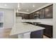 Bright, modern kitchen features sleek countertops, stainless steel appliances, and ample cabinet space at 7241 Goldbloom Ln, Littleton, CO 80125