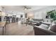 Bright and airy living room with modern decor, featuring hardwood floors and ample natural light at 22 S Harlan St, Lakewood, CO 80226
