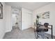 A well-lit office features a sliding door closet and gray carpet at 22 S Harlan St, Lakewood, CO 80226