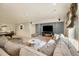 Relax in the finished basement's lounge area and pool table at 56330 E 37Th Ct, Strasburg, CO 80136