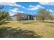 A charming home with well-maintained lawn and landscaping, offering inviting curb appeal and a tranquil setting at 56330 E 37Th Ct, Strasburg, CO 80136