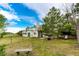 Expansive fenced backyard with a deck and outdoor seating, perfect for relaxation and entertaining at 43388 Somerset Ct, Elizabeth, CO 80107