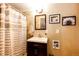 Functional bathroom with shower, vanity, mirror and modern hardware at 43388 Somerset Ct, Elizabeth, CO 80107