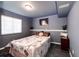 Comfortable bedroom featuring carpet, a large window, and decorative string lights at 43388 Somerset Ct, Elizabeth, CO 80107