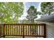 Outdoor deck shows beautiful views of surrounding nature and nearby lake at 43388 Somerset Ct, Elizabeth, CO 80107