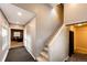 Inviting entryway featuring a staircase and views into a comfortable living area at 43388 Somerset Ct, Elizabeth, CO 80107