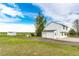 Exterior view of a two story home with a well-maintained lawn, garage and shed at 43388 Somerset Ct, Elizabeth, CO 80107