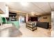 Open living room featuring carpeted floors, recessed lighting, and modern decor at 43388 Somerset Ct, Elizabeth, CO 80107