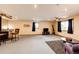 Relaxing open living room with ceiling fans and an abundance of natural light at 43388 Somerset Ct, Elizabeth, CO 80107