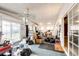 Spacious sun room with a ceiling fan, multiple windows, and sliding glass door at 43388 Somerset Ct, Elizabeth, CO 80107