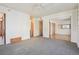 Spacious bedroom with carpet flooring and access to bathroom and other rooms at 534 E 7Th Ave # 107, Denver, CO 80203