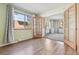 Inviting living area with hardwood floors, large windows, and lots of natural light at 534 E 7Th Ave # 107, Denver, CO 80203