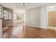 Spacious living room featuring wood floors and abundant natural light at 534 E 7Th Ave # 107, Denver, CO 80203