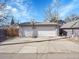 Detached garage with parking and basketball hoop at 5920 S Bemis St, Littleton, CO 80120