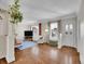 Inviting living room featuring hardwood floors and plenty of natural light at 5920 S Bemis St, Littleton, CO 80120