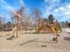 A colorful community playground with slides and climbing equipment at 5920 S Bemis St, Littleton, CO 80120