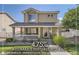 Charming home with a desirable assumable fixed interest rate, a cozy front porch, and landscaped front yard at 11832 Zenobia Loop, Westminster, CO 80031