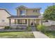 Charming two-story home with a covered front porch, landscaped yard, and a welcoming entrance at 11832 Zenobia Loop, Westminster, CO 80031
