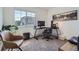 Stylish home office with large windows and modern furnishings at 11832 Zenobia Loop, Westminster, CO 80031