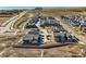 New homes being built in aerial view showing a community close to highways and mountain views at 128 E Douglas St, Superior, CO 80027