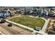 Expansive community green space is surrounded by modern homes, offering residents a serene and inviting outdoor area at 128 E Douglas St, Superior, CO 80027