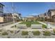 Inviting community space has a central gazebo, manicured lawn, and seating areas for residents to enjoy at 128 E Douglas St, Superior, CO 80027