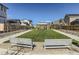 Inviting community space has a central gazebo, manicured lawn, and seating areas for residents to enjoy at 128 E Douglas St, Superior, CO 80027