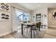 Bright dining room with stylish decor, comfortable seating area, and large windows at 128 E Douglas St, Superior, CO 80027
