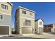 Modern two-story home shows neutral siding, a balcony, and attached garage, with well-kept landscaping at 128 E Douglas St, Superior, CO 80027