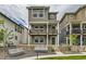 Charming two-story home with a cozy front yard features a picket fence and inviting outdoor seating at 128 E Douglas St, Superior, CO 80027