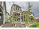 Charming two-story home features a cozy front patio, perfect for enjoying the outdoors at 128 E Douglas St, Superior, CO 80027