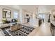 Open-concept living space with modern kitchen, and comfortable seating area at 128 E Douglas St, Superior, CO 80027